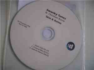 Swanky Tunes Ft. Christian Burns - Skin & Bones