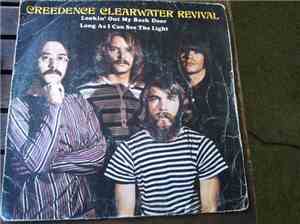 Creedence Clearwater Revival - Lookin' Out My Back Door / Long As I Can See The Light