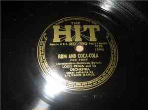 Louis Prima - Rum And Coca Cola / I Wanna Get Married