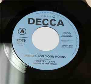 Loretta Lynn - Wings Upon Your Horns / Let's Get Back Down To Earth